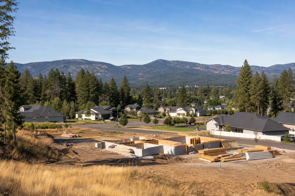 Early-stage single-family home construction in a northern Idaho neighborhood