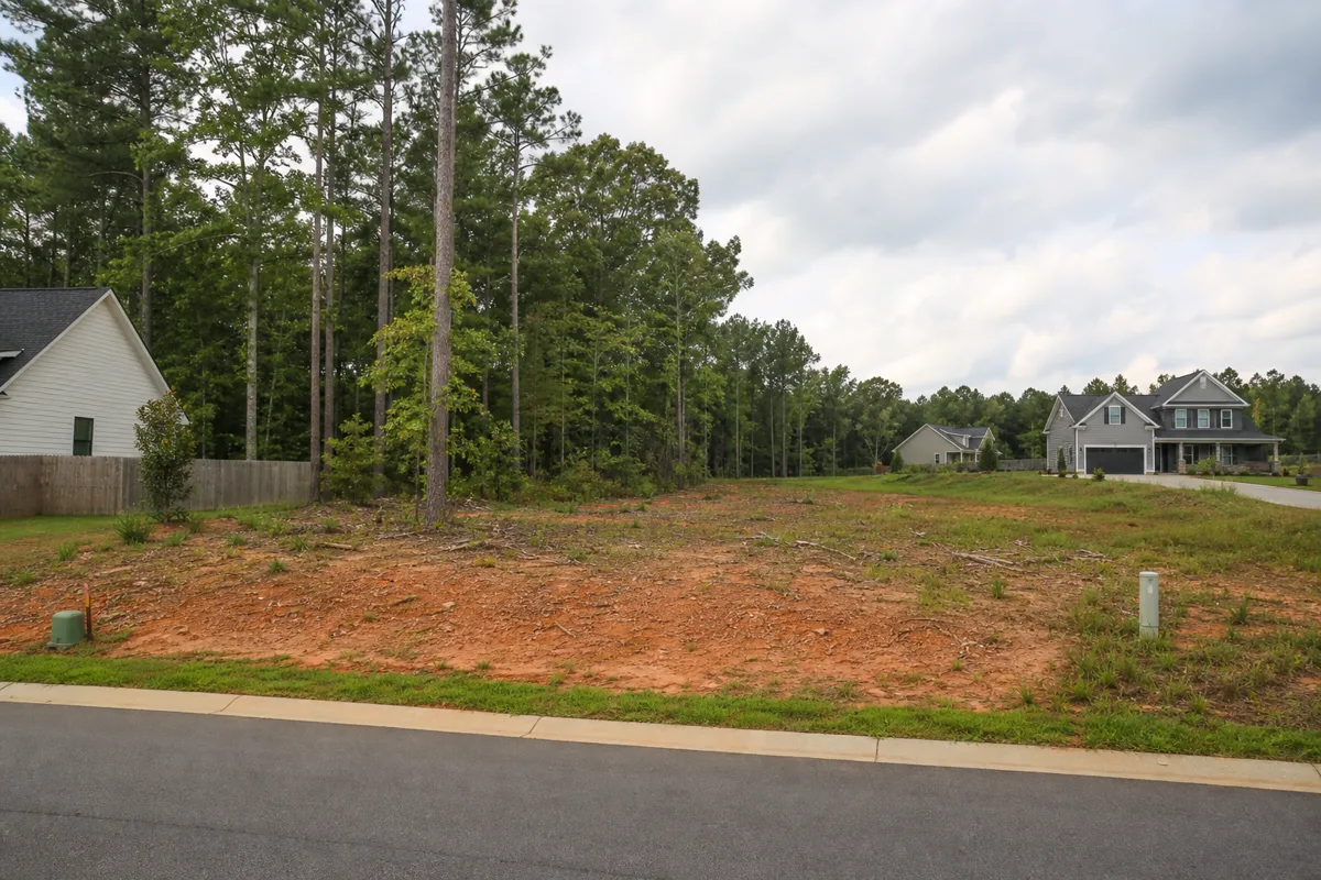 Buildable residential lot with mixed woodland in a growing Southeastern community